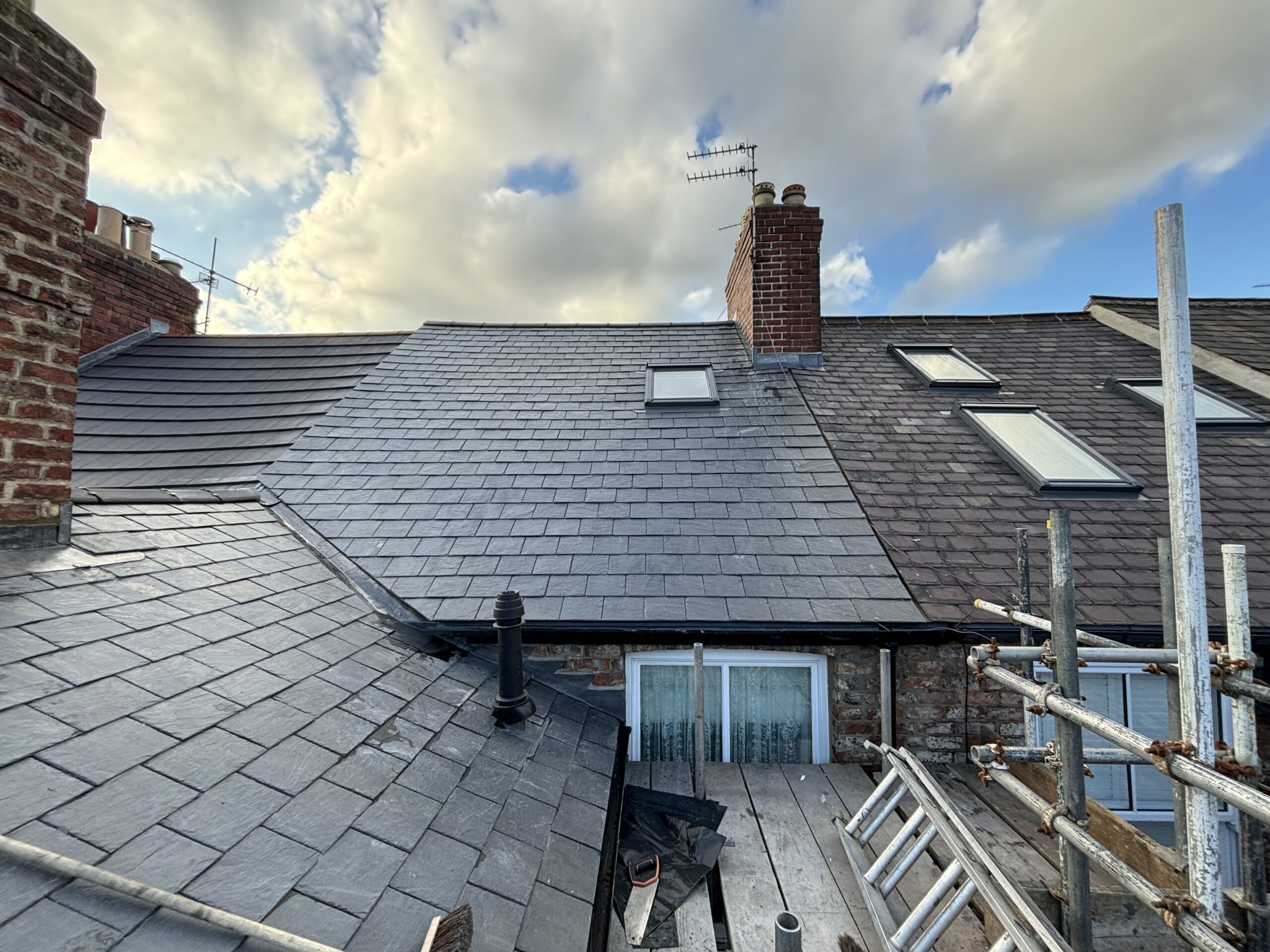 Slate roof repair on UK terraced house